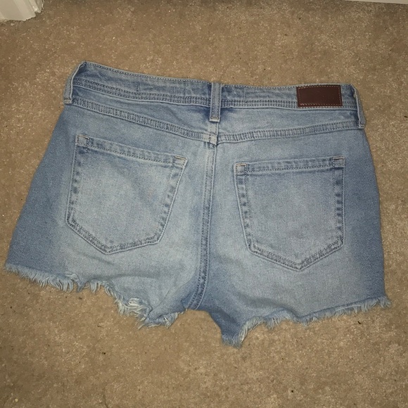 Ripped denim shorts with buttons - Picture 3 of 3